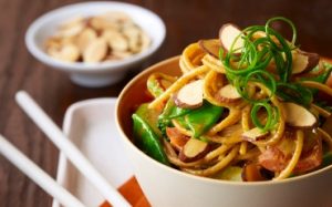 Vegetables and noodles with almond sauce