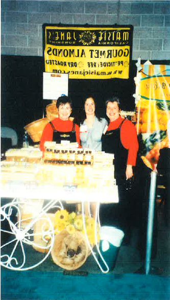 Maisie Jane, Mary Jane, and Aunt Bobby exhibiting at Natural Products Expo in Anaheim, CA   1999
