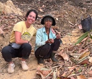 Maisie Jane with Cashew Farmer.