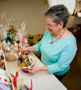 Maisie Jane's Mom wrapping a gift basket