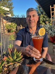 Maisie's Husband, Isidro drinking the yummy red beer!